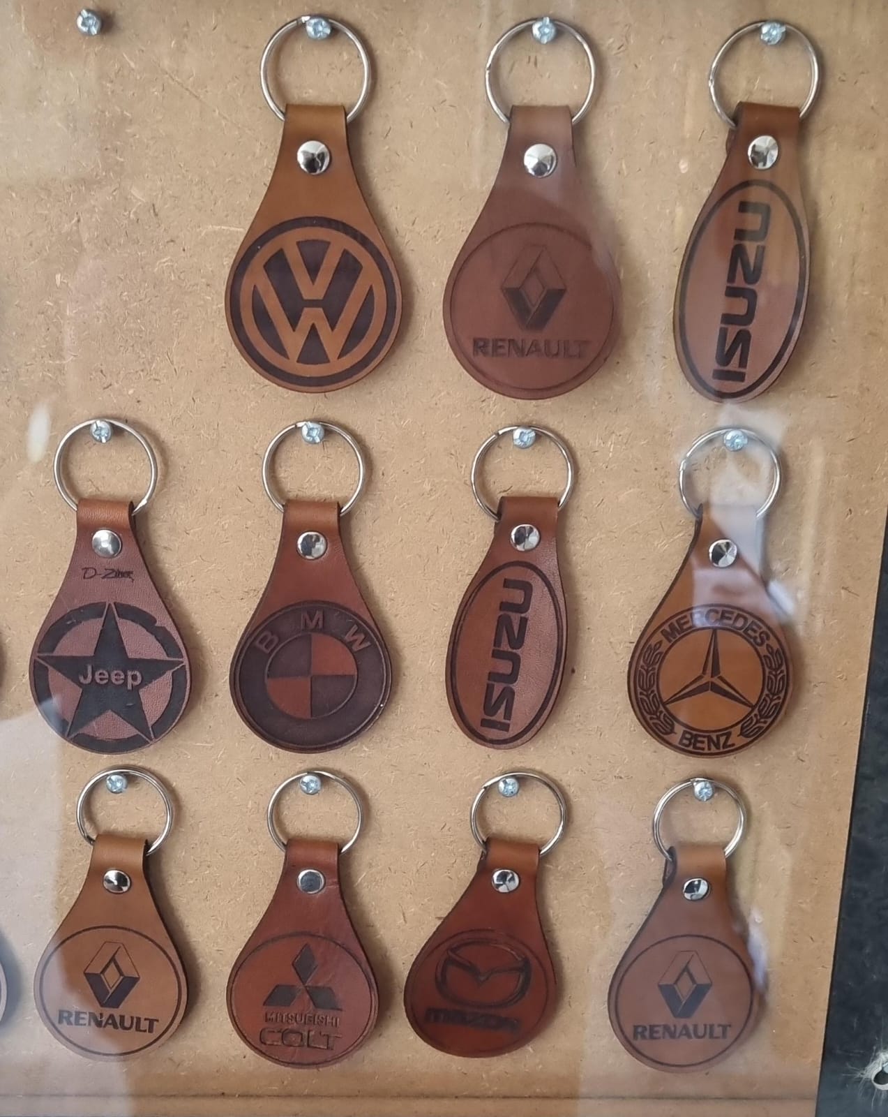 BRANDED KEY RINGS, CUPS, CLOTHES ETC.